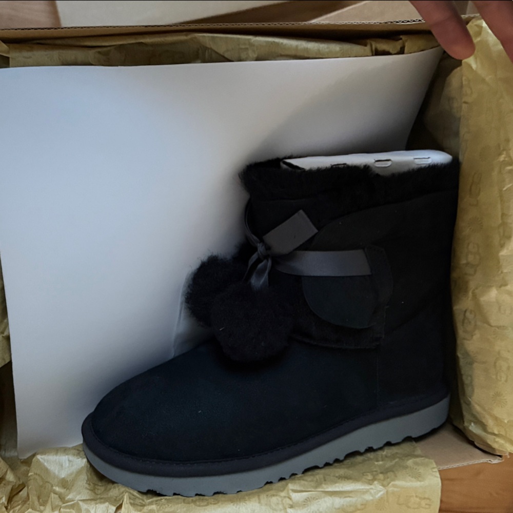 UGG Dark Suede Boots with Pom Accents